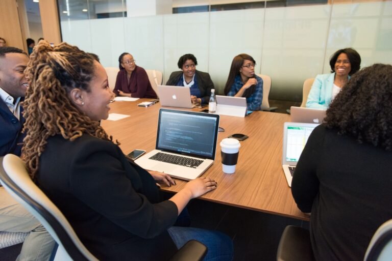 Diverse team working together in an office — employer immigration services