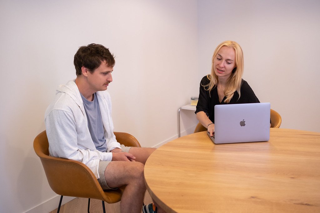 Young professional in a workplace meeting, representing co-op work experience